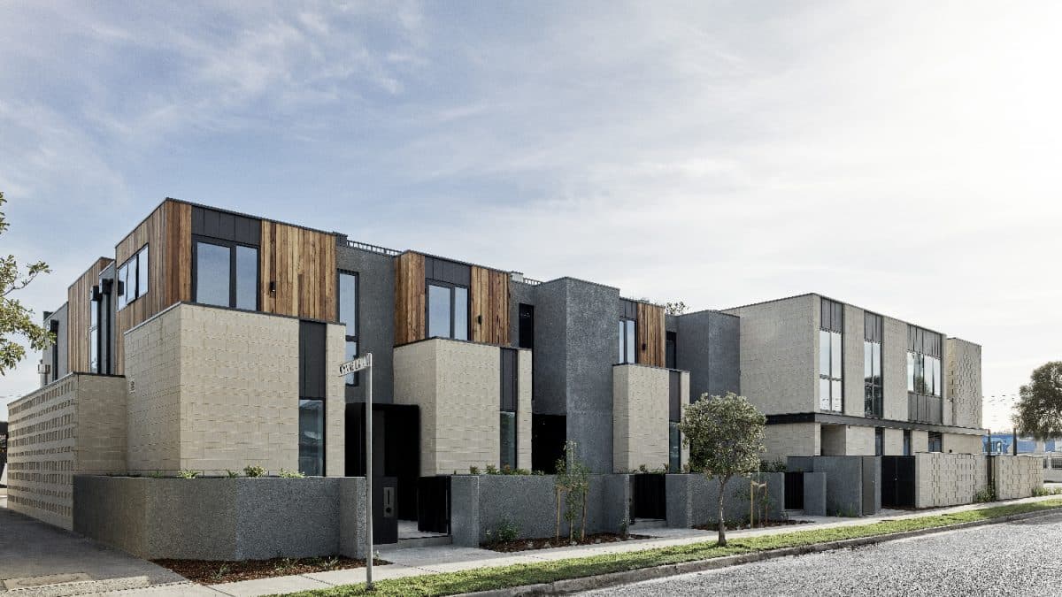 Image of a modern and sleek townhouse development.